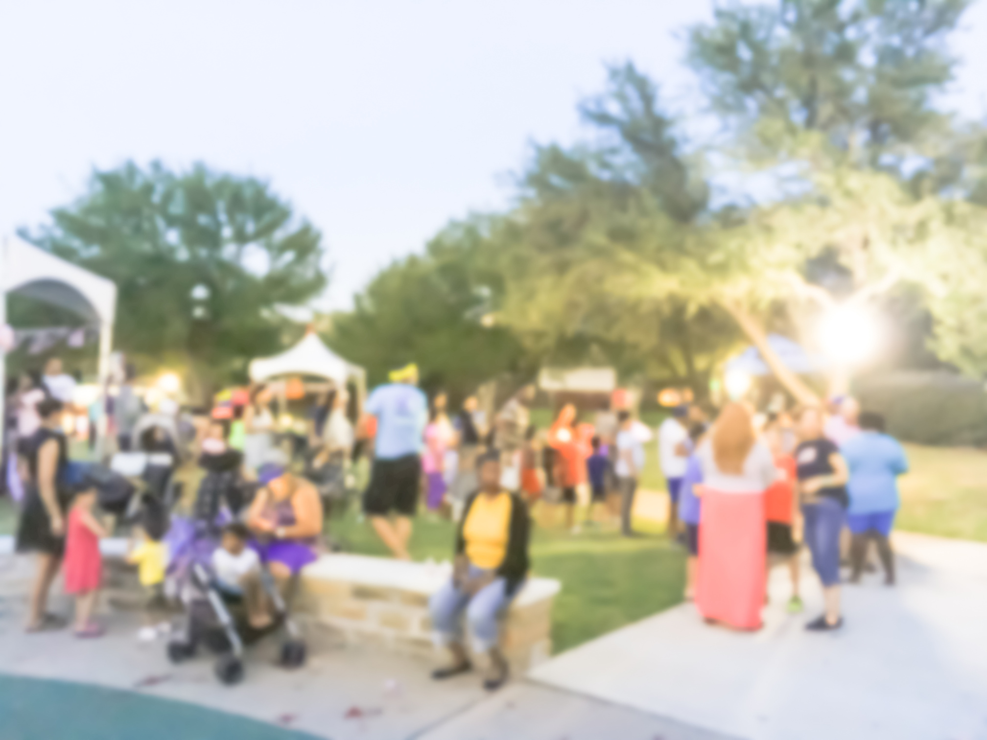 Abstract blurred community event July 4th celebration in Irving, Texas, USA